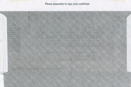 Close-up view of security paper with text reminding to sign certificate.